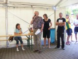 Claudia, JÃƒÂ¼rgen und Thomas nehmen die Siegerehrung vor